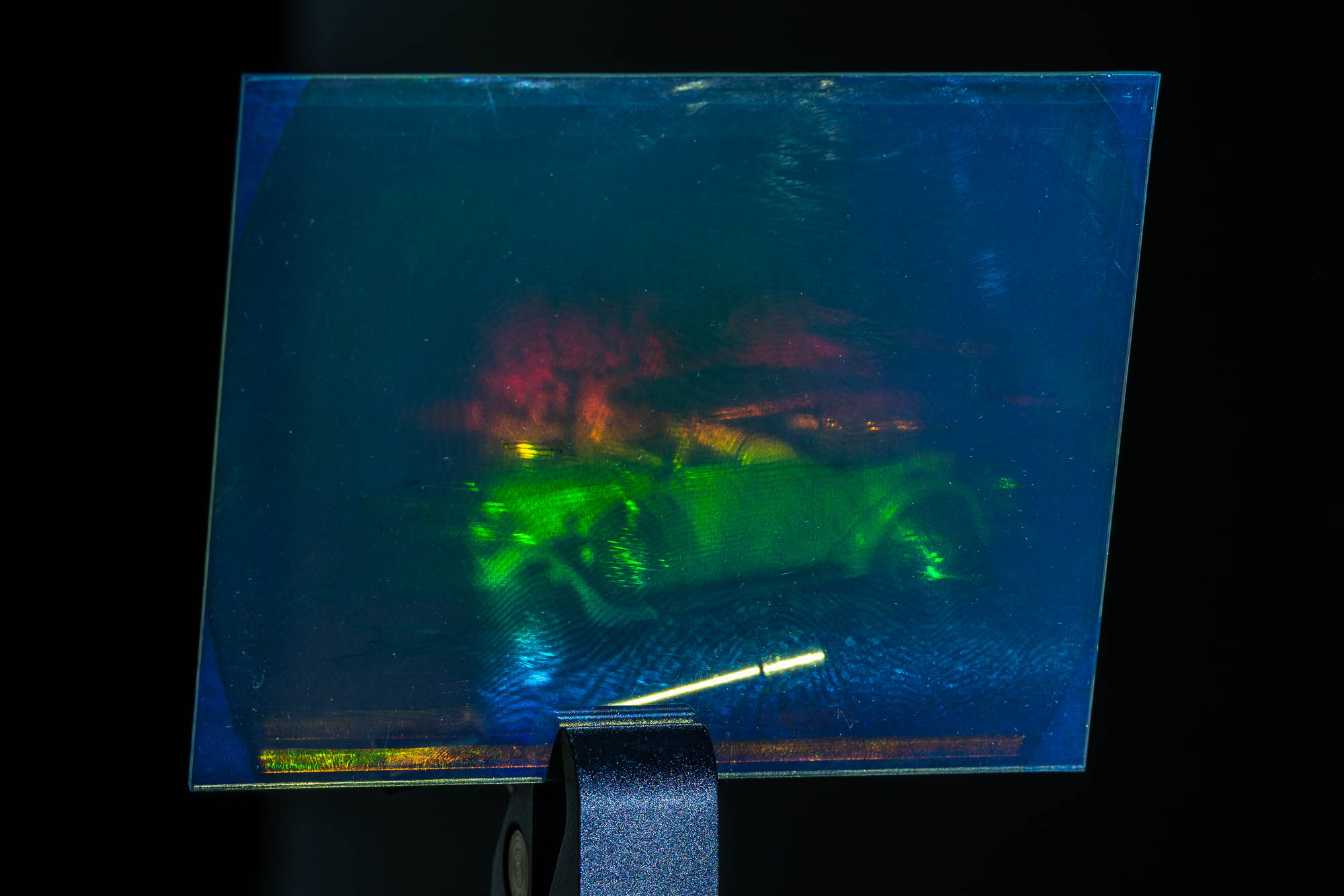 Regenbogen-Hologramm - vertikale Drehung