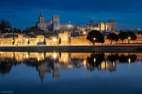 Avignon is reflected in the Rhône