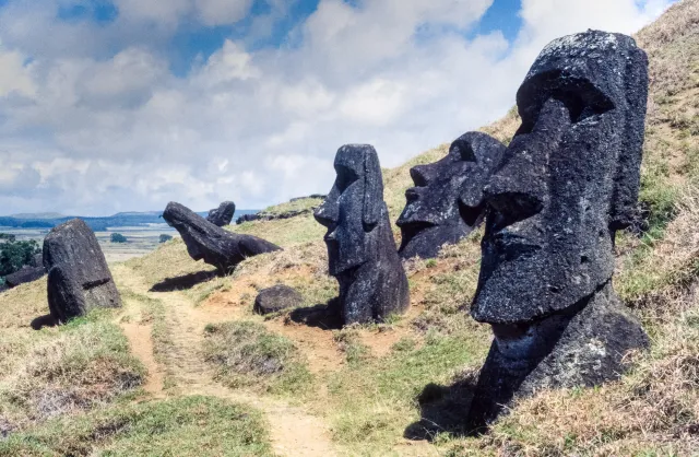 Walk with Moai, the colossal stone statues of Easter Island (Rapa Nui).