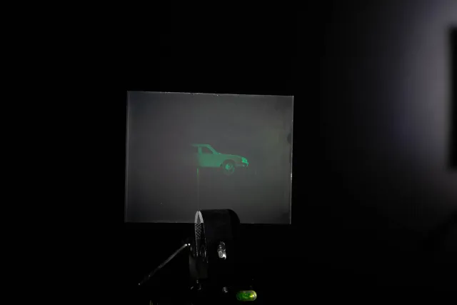 White light hologram of a model car from different viewing angles
