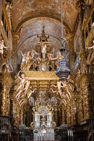 The high altar with the seated figure of St. James under a gilded canopy