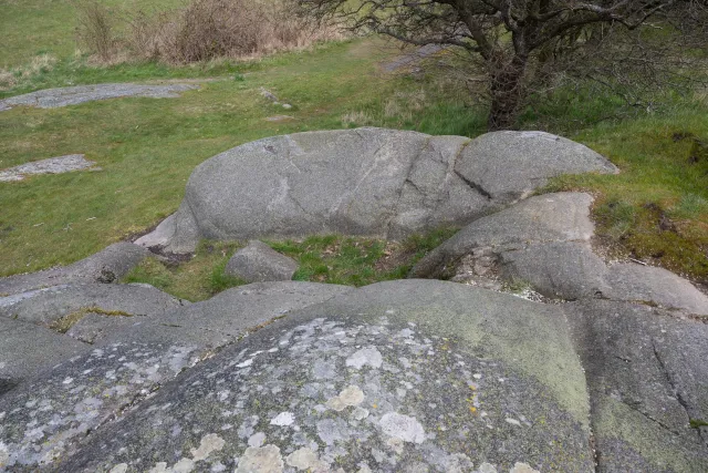Stone carvings in Madsebakke on rock outcrop at Allinge-Sandvig
