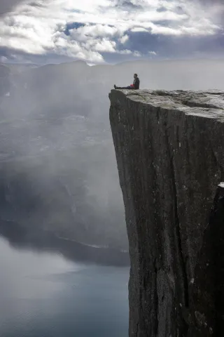 A hiker alone on the edge
